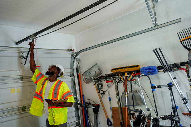 Professional Garage Door Installation technician working in Muskingum County County, OH